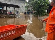 Banjir Jakarta: 77 RT Terendam, Warga Mancing di Genangan