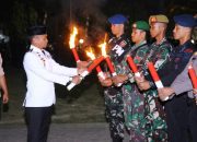 Kapolres Bone Hadiri Upacara Taptu dan Pawai Obor Peringatan HUT ke-80 Kemerdekaan RI