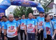 Harli Siregar bersama PJU Kejatisu Berbaur bersama Masyarakat di Jalan Amal Bersama Yayasan Thongs Berkah Mulia Abadi