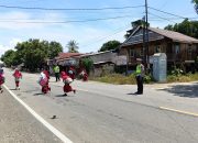 Jaga Keamanan dan Ketertiban, Polantas Polda Sulbar Lakukan Pengaturan dan Edukasi Lalu Lintas Menyeluruh di SD Inpres Auni Kalukku
