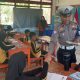 Ditlantas Polda Sulbar Bagikan Bendera Merah Putih di SD Lengke: Tanamkan Cinta Tanah Air Sejak Dini
